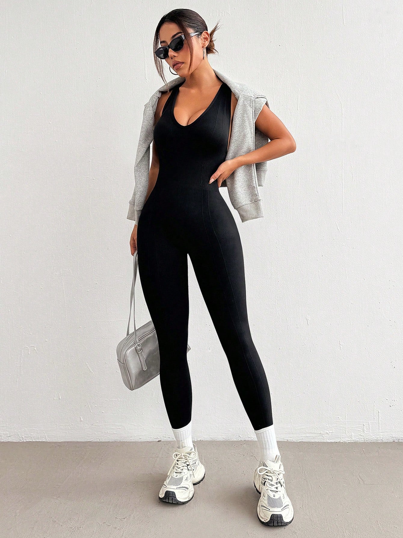 Sport Easify Women's Fashionable Sporty Cross-Design Backless Bodycon Jumpsuit Airport Outfit